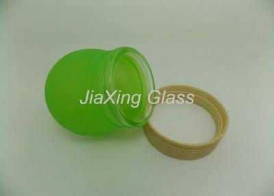 China 100g Green Glass Cosmetic Jars Wide Mouth Recycled Glass Jar With Plastic Cap for sale