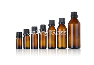 China Amber Essential Oil Bottle 5ml 10ml Black Screw Plastic Caps for sale