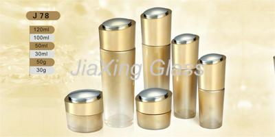 China Luxury Golden Skin Care Packaging Sets Glass Empty Cosmetic Packaging for sale