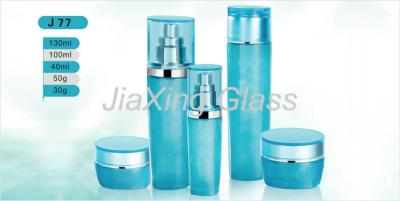 China Custom Printed Cosmetic Glass Bottles Blue Empty Face Cream Packaging for sale