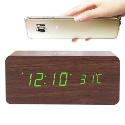 China Calendars Time Calendar Temperature Alarm Doze 4in1 Alarm Table Clocks Handwork Night Safe Wireless Charging Wooden Clock for sale