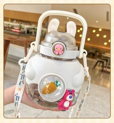 China 1150ml Big Capacity Cute Children Drinking Portable Plastic Water Bottle with Straw for sale