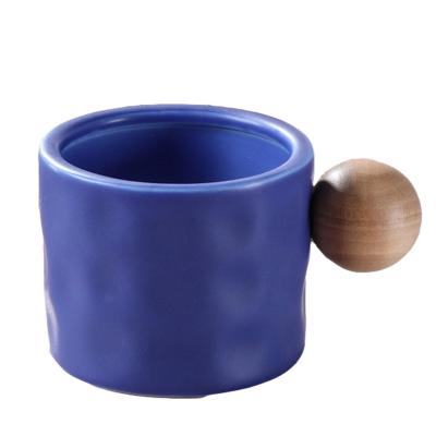 China Nordic Style Ceramic Coffee Mug with Wooden Ball Handle 330ML Porcelain Reusable Cups for sale