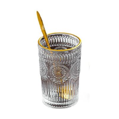 China OEM Creative Retro Embossed Sunflower Whisky Milk Juice Tumbler Glass Heat-resistant Water Cup for sale