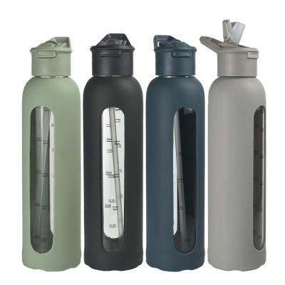 China Motivational Glass Water Bottle with Silicone Sleeve and Portable Time Marker Reminder for sale