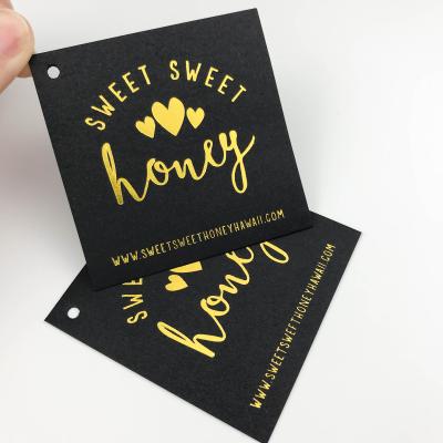 China Sustainable Custom Apparel Hang Tag Customized Tags For Apparel Garment Paper Hang Tags To Foil Gold Effect for sale