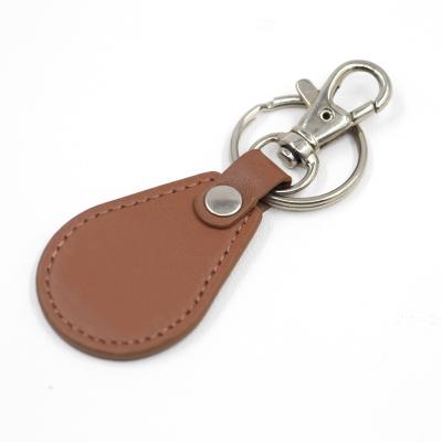 China Promotion Gift Unisex Leather Key Chain Factory Customized PU Key Chain For Men And Women Business Gift Car Key Strap for sale