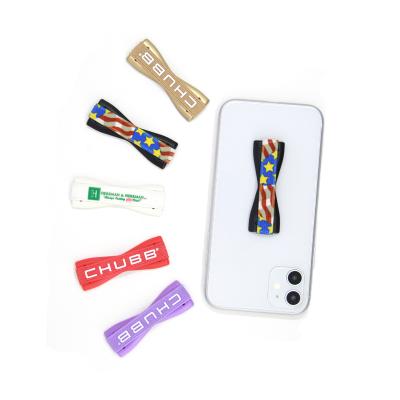 China Mobile Phone Protector Mobile Phone Sticky Strap with 3M and the Soft Elastic Belt Sticky to the Back of Mobile Phone for sale