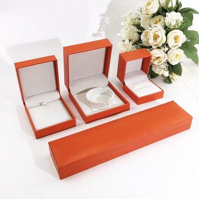 China Custom Luxury Jewelry Package New Arrival Pink Velvet Earring Gift Portable Jewelry Ring Packaging Boxes for sale