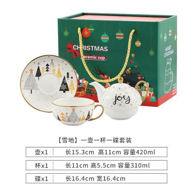 China Amazon CIS Christmas Sustainable Hot Selling Ceramic Mugs and Dishes Gold Plated Tea Set Set Christmas Gifts One Pot One Mug for sale