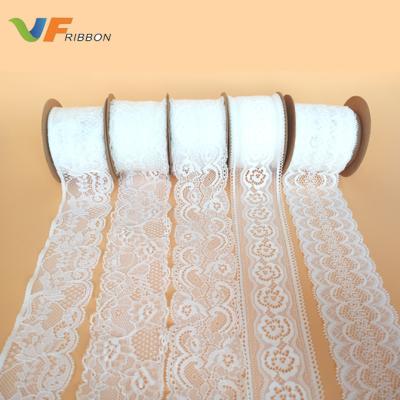 China Hot Selling Popular 55MM Eco-friendly Polyester White Elastic Lace For Dress Lace Fabric Embroidery for sale