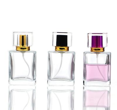 China Care Clear Wholesale 30ml 50ml Personal Empty Perfume Glass Spray Bottle Square Design for sale