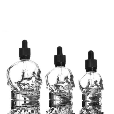 China Cosmetic Free Sample Empty Luxury Glass Skull Shape Head Glass Perfume Essential Oil Dropper Bottles 15Ml 30Ml 50Ml 100Ml for sale