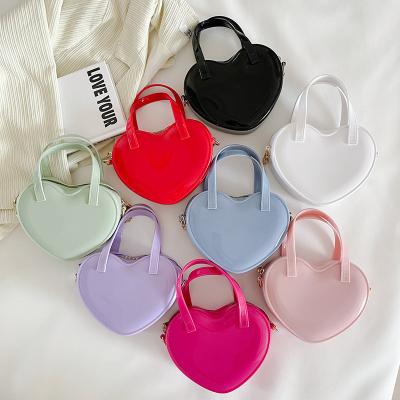 China Fashion 2022 New PVC Kids Small Mini Colorful Jelly Handbags For Girls Jelly Heart Purse And Bags for sale