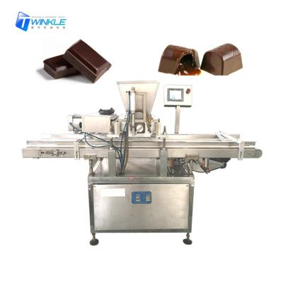 China Automatic Cooking Oil Factory Center Filled Pulled Ball One Chocolate Making Machine for sale