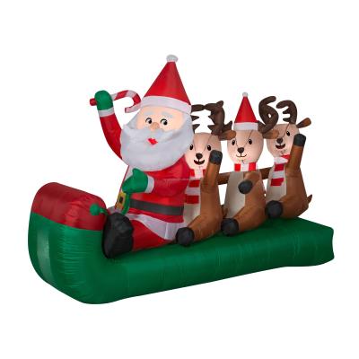 China Promotion Green Airblown Santa Sledding with Inflatable Reindeer Stage Christmas for sale