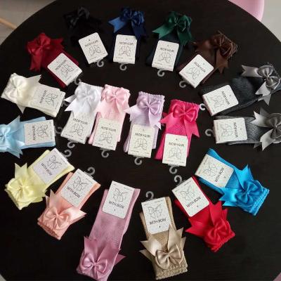 China Antibacterial Simple 19 Colors Baby Ruffles Cute Organic Cotton Knee High Long Bow Baby Socks for sale