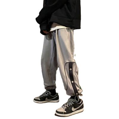 China QUICK-DRY buckle pants 2021 Korean new trend men's casual sports pants loose joker wide-leg straight pants for sale