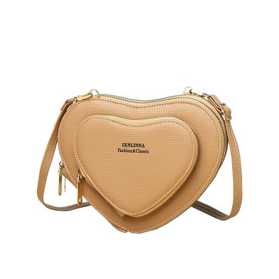 China High Quality Women's Crossbody Messenger Bags PU Fashion Motion Detection Ladies Heart Pattern Shoulder Bag Luxury Leather Designer Women's Handbag for sale