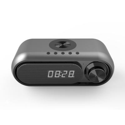 China Portable Wireless Charger for Mobile Phone FM Radio TF Card Plug BT All-in-one Speaker with LED Clock Alarm for sale