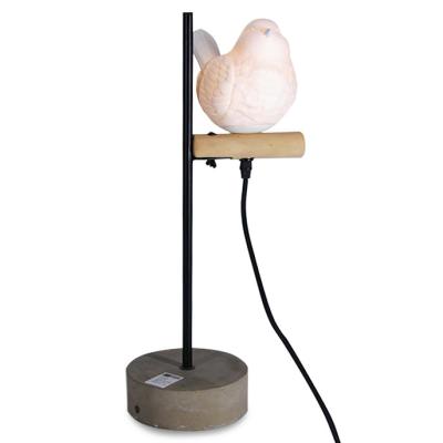 China Creative Low Bedside Bird Bedside Nightstand Hotel Bedside Table Lamps Cement Lamp Modern Table Ceramic Night Light Decoration for sale