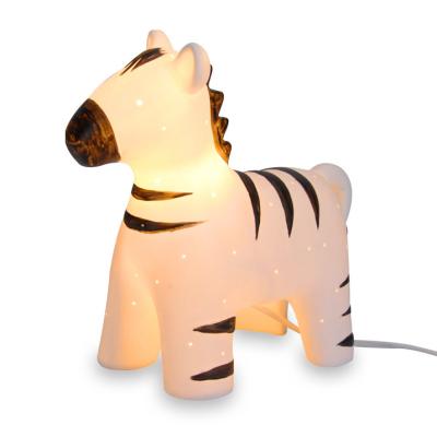 China Modern Creative Porcelain Bedside Lamp Decoration 3D Night Lamp Child Zebra Shape Animal Art Unique Nightlight for sale