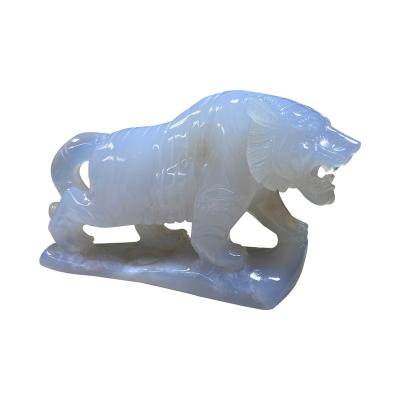 China Animal Art folk tiger figurine blue chalcedony quartz crystal carving hand carved tiger crystal crafts for decoration for sale