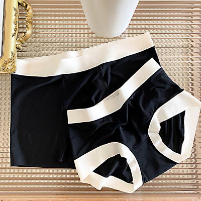 China Solid Color Breathable Unique Sexy Cotton Design Logo Couples Custom Underwear for sale