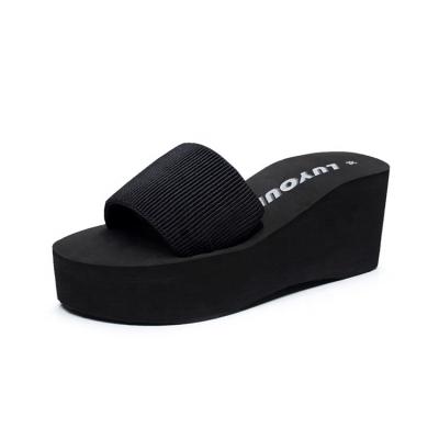 China Fashion trend summer high heels fashion new a line simple cool drag slope heel deep soled women's slippers women's beach sho for sale