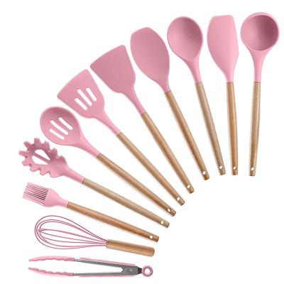 China Minimalist Wholesale Silicone Daily Kitchen Utensils Set Wooden Handle Silicone Non-stick Cooking Tools Kitchen Accessories for sale