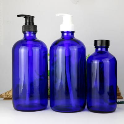 China Personal Care 480ml 16oz Blue Glass Liquid Soap Dispenser Bottle With Pump Sprayer for sale