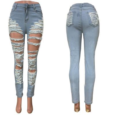 China Women's new QUICK DRY pants autumn and winter ripped denim pants Lady's Popular Lady small large size hole foot elastic jeans for sale