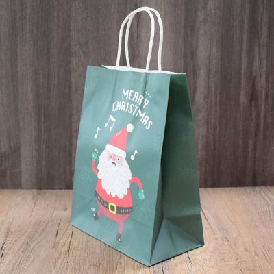 China Wholesale Custom Recyclable Santa Claus Elk Cartoon Pattern White Christmas Kraft Paper Bag for sale