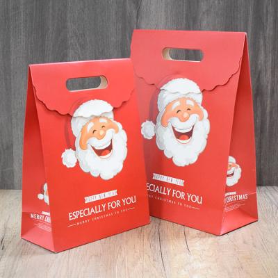 China Custom Wholesale Biodegradable Christmas Candy Red Paper Bag With Flip Lid for sale