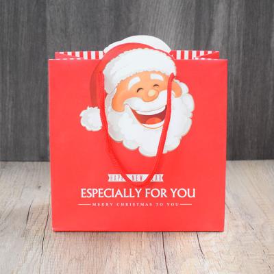 China Merry Christmas Biodegradable Wholesale Custom Red Candy Paper Bag For Gift for sale