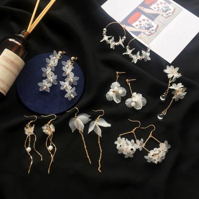 China TRENDY New Flower Bohemia Handmade Earrings Fashion Long Hanging Earrings Geometric Statement Earrings for sale