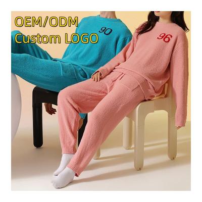 China Wholesale Sleepwear QUICK DRY Winter Women Letter Pattern Loungewear 2 Pieces Set Plush Fuzzy Top Pants Designer Family Christmas Pajamas for sale