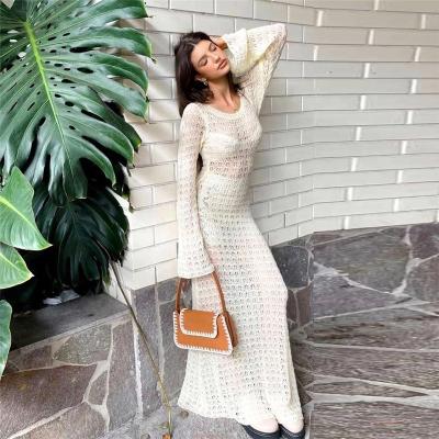 China Factory Antibacterial Ladies Dress Long Cavity Long Skirt Backless Knitted Sleeve Perspective Mesh 2022 Summer Seaside Beach Maxi Dresses for sale