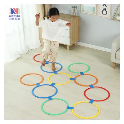 China Sports Toy Fun Games 10 Pcs Plastic Training Hopscotch Game Ring Game Toys For Children For Preschool Children for sale