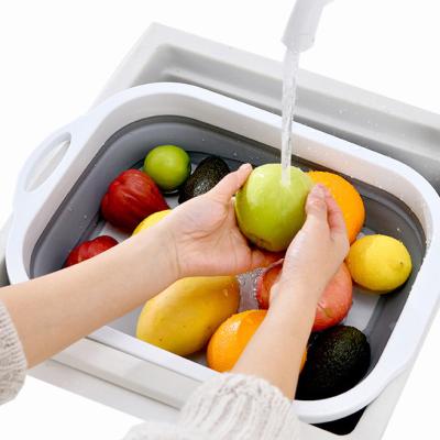 China Sustainable Foldable Plastic Cutting Board With Folding Bucket Wash Chopper With Collapsible Colander Sink With Strainer for sale