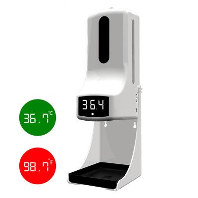 China Foam Automatic Measuring Temperature Soap Dispenser K9 Disinfection Pro Freeze Thermometer Dispenser Non-contact Soap Dispenser for sale