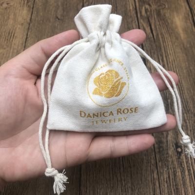 China A side cord; custom printed two sides drawstring logo in gold cotton drawstring pouch jewelry packaging gift bag cotton dust bags 8x10 cm for sale