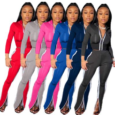 China Autumn Matching Zipper Breathable Crop Top And Long Sleeve Split 2 Piece Pants Set Women Clothing Stacked Pants Set for sale