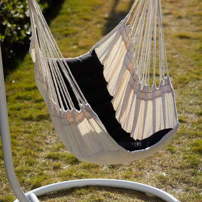 China Comfortable hammock chair with macrame lace fringe tassel with pillow and pocket for indoor outdoor with wooden rod and stand for sale