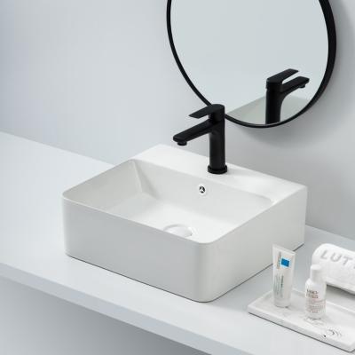 China Best Waterproof Selling European Stylish Sanitary Ware Single Hole Bathroom Countertop Wash Basin Rectangular Glossy White Hand Basin for sale