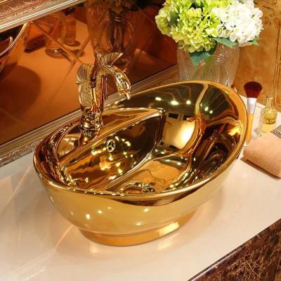 China Factory Style High Longevity Gold Color Ceramic Wash Hand Basin Porcelain Wholesale Waterproof Luxury Royal Golden Bathroom Sink for sale