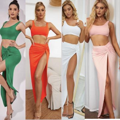 China 2022 Breathable Hot Fashion Sexy Yingchchao Sleeveless Bodycon Dress Crew Neck Long Slit Skirt 2 Pieces And Irregular Top Women Sets Dress for sale