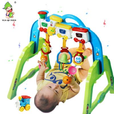 China Intelligent Toy Fitness Frame Train Game Toys Mat Baby Activity Educational Gym with Light and Music for sale