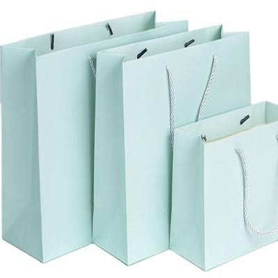 China Handmade Wholesale Color Lamination Dongguan Green Yellow Blue Blue Paper Bag For Clothes Single Paper Bag for sale