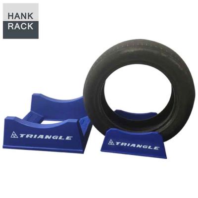 China Plastic Portable Tire Display Tire Feet Rack Triangle Tire Display Stand for sale